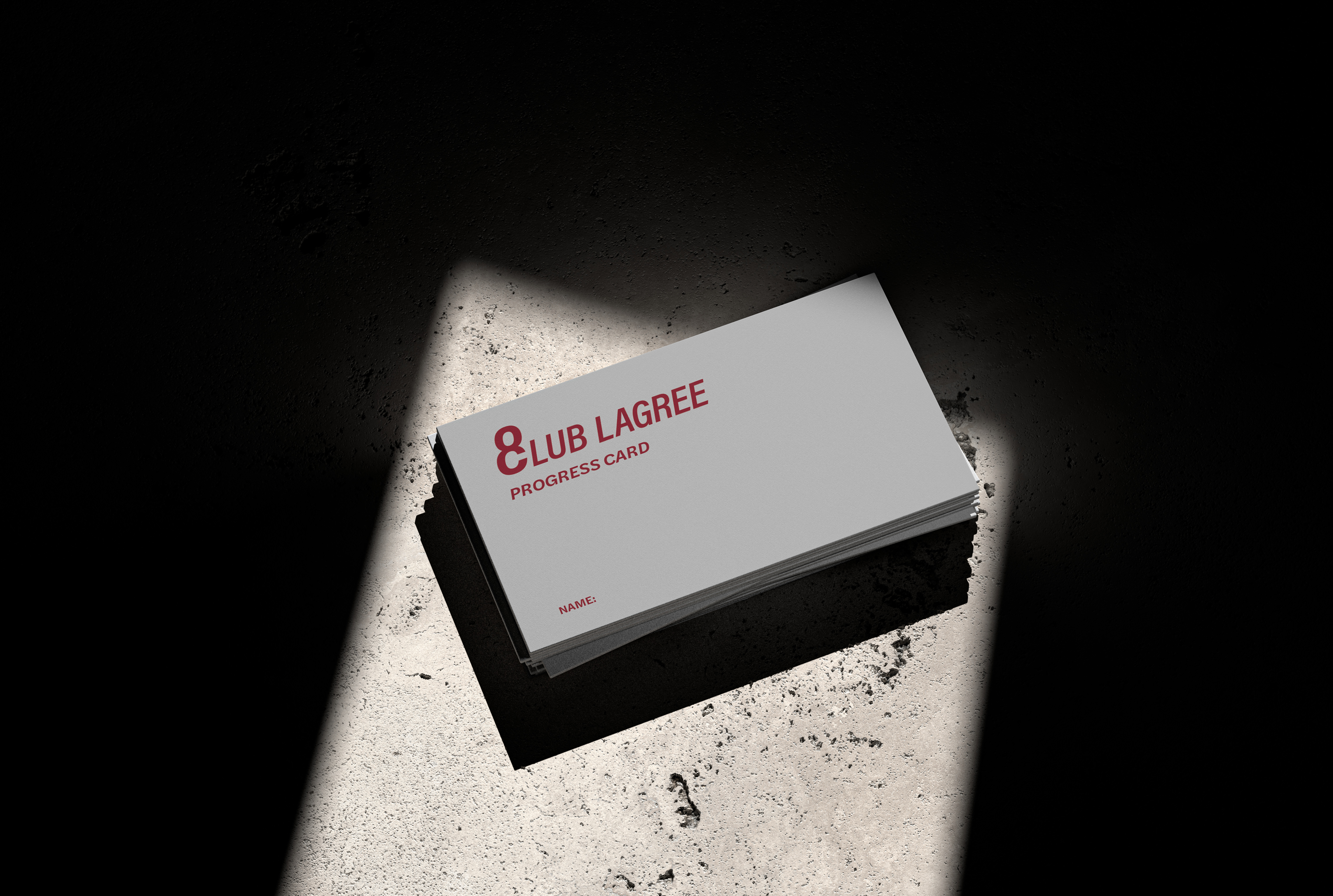 The white 8CLUB Progress Card displayed under a spotlight